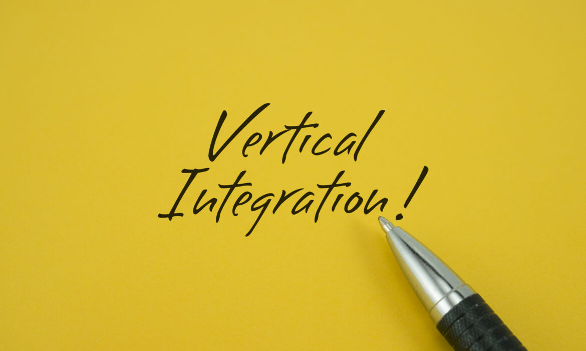 Dynamic Lifecycle Innovations offers vertically integrated reverse logistics solutions, as highlighted by a pen pointing to Vertical Integration! on yellow.